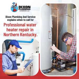 Two professional technicians working on water heater systems.